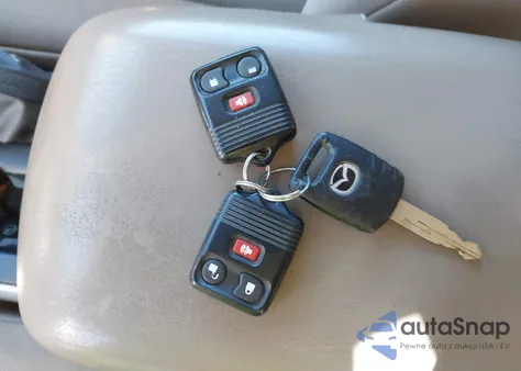 2005 Mazda Tribute S from USA, damaged, VIN 4F2YZ04135KM13277